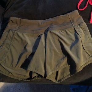 size 6 lululemon army green shorts